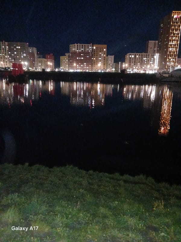 Evening cityscape memories captured along Yekaterinburg's Iset River