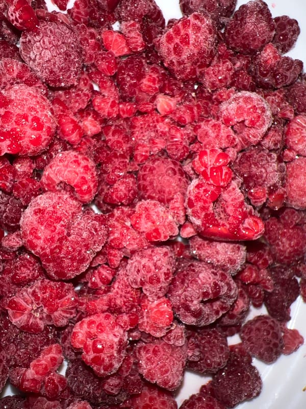 Frozen raspberries with ice crystals photographed in Burgas