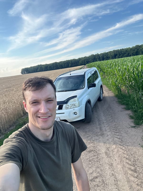 Selfie stop on a rural Ukrainian dirt road between crop fields