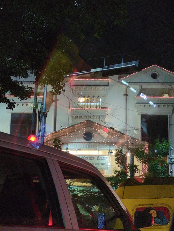 Illuminated Building With Festival Lights Observed in Bengaluru