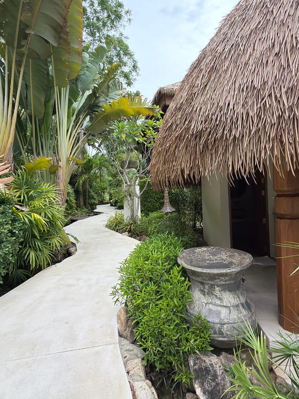 Inside a lush Ko Samui resort's gardens and bungalows