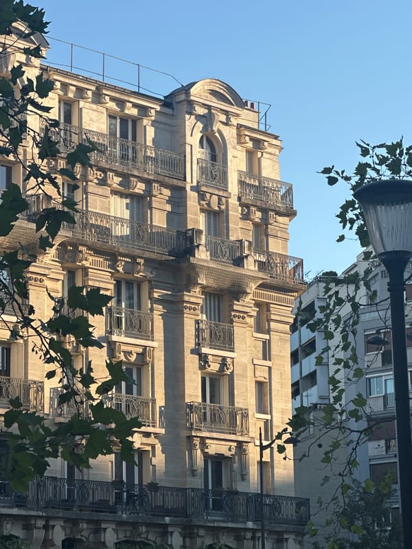 Haussmannian streetscape in Paris on a clear afternoon