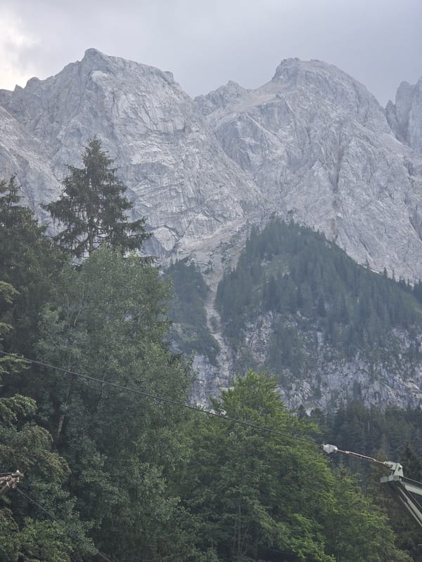 Zugspitze cable car and railway under heavy Alpine cloud cover
