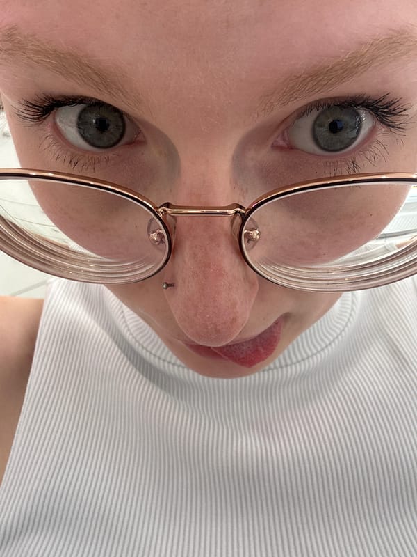 Close-up selfie series exploring angles and eyewear
