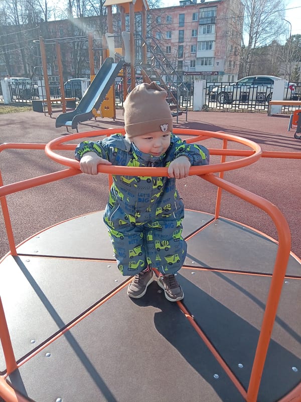 Playground scenes with child, equipment documented in early morning