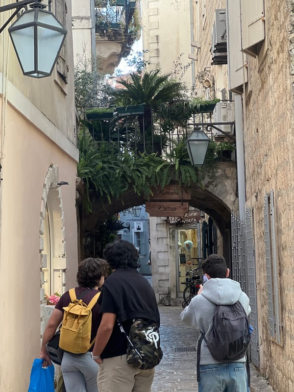 Tourist scenes documented across Budva's old town and harbor