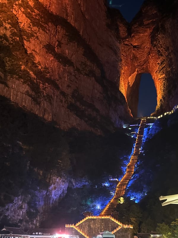Tianmen Mountain's lit arch and skywalk at night
