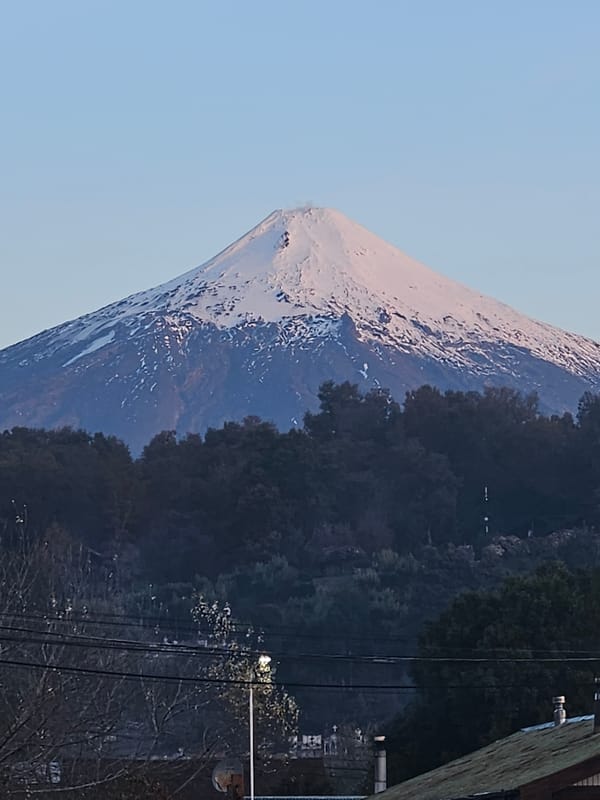 Snow-capped volcano observed near Pucón, Chile