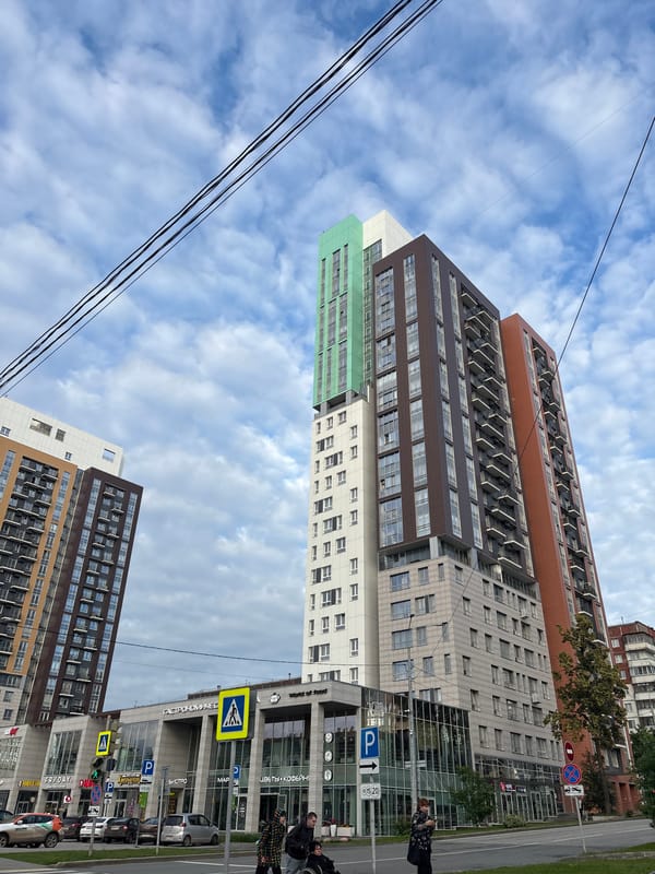 Perm streetscapes, Soviet and modern apartment blocks, afternoon