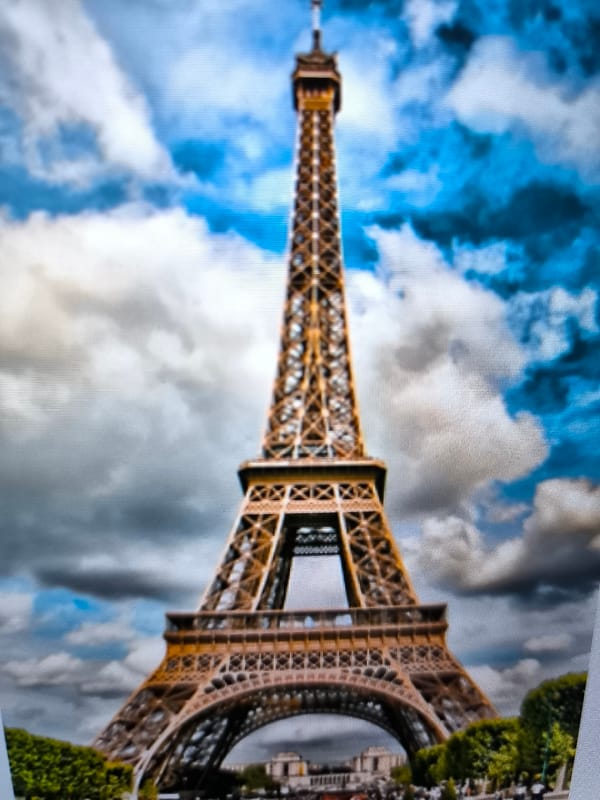 Mixed memories captured in Pélussin: Eiffel Tower, local scenes