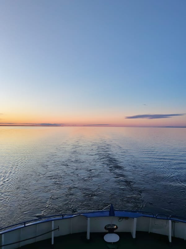 Sunset boat journey captured on Russian waters
