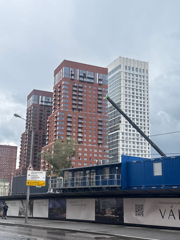Street-level look at a dense modern urban development