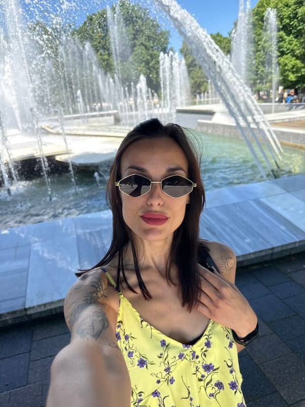 Woman takes selfies at Pleven fountain Tuesday morning