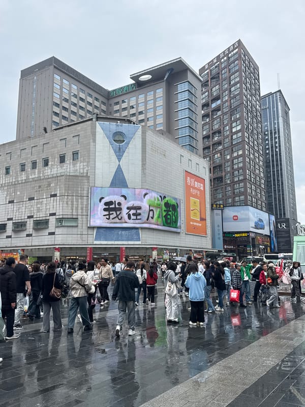 Morning street life and shopping activity in Chengdu's Jinjiang District