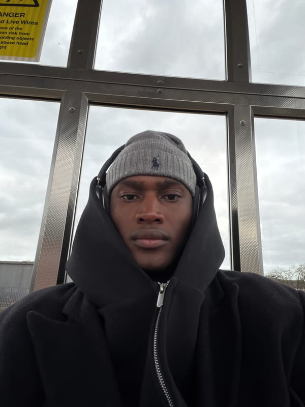 Person in beanie spotted inside glass shelter in Harborough