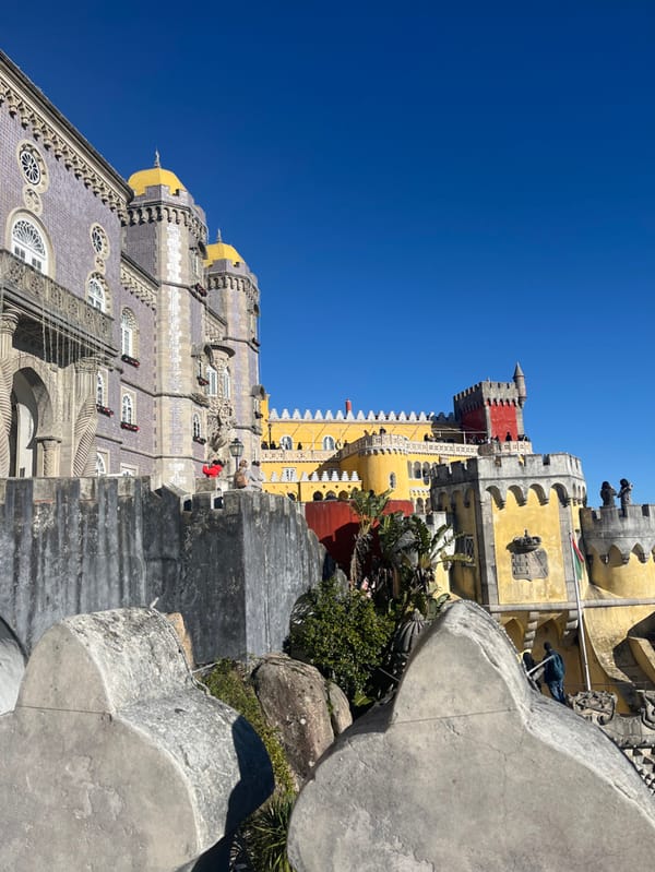 Tourist documents historic palace tour in Sintra, Portugal