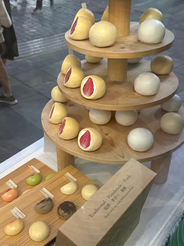 Milan street life and mochi display captured Wednesday afternoon