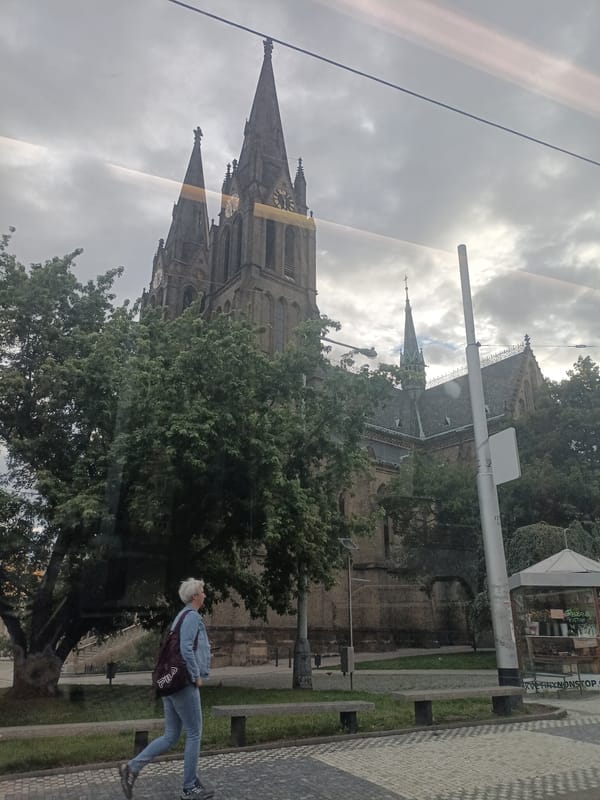 Early morning tram journey past Prague's Gothic basilica documented