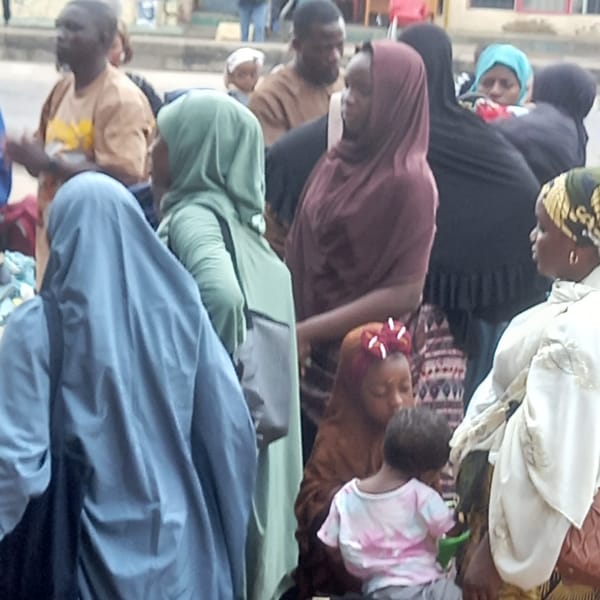 Large crowds gather with belongings in northern Nigeria towns