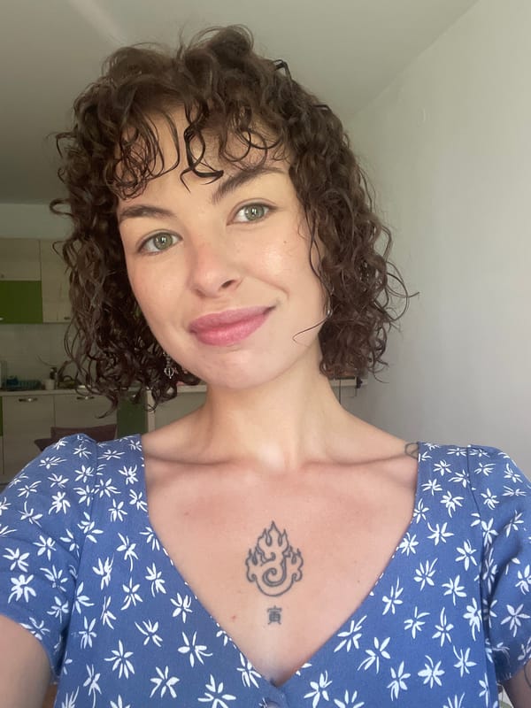Smiling portrait in a floral blue dress, Boreti, Montenegro