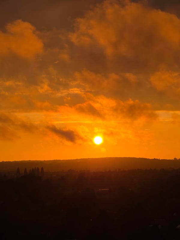 Vivid orange sunset over the Szczecin skyline