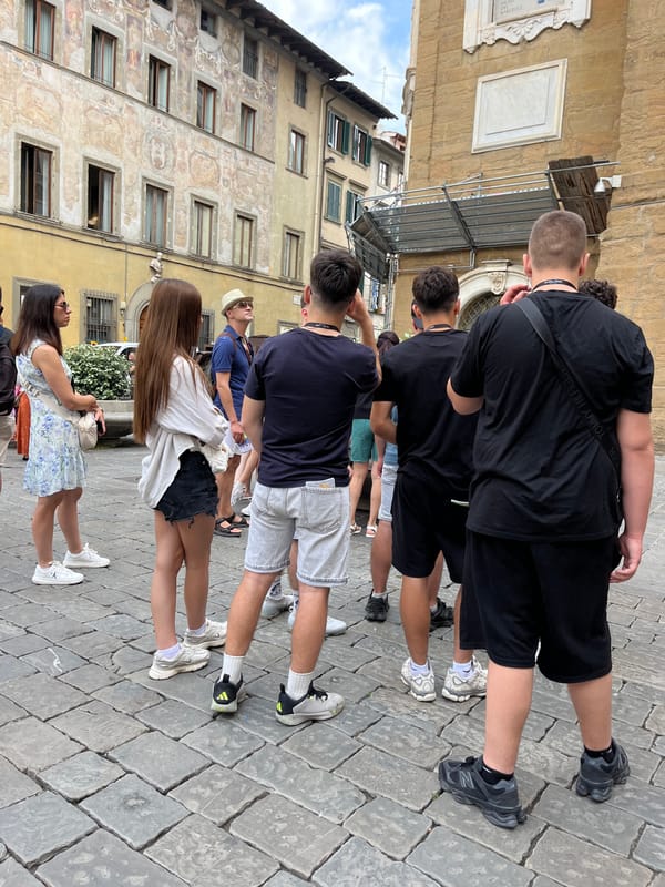 Tourist group explores Florence's historic streets during morning tour