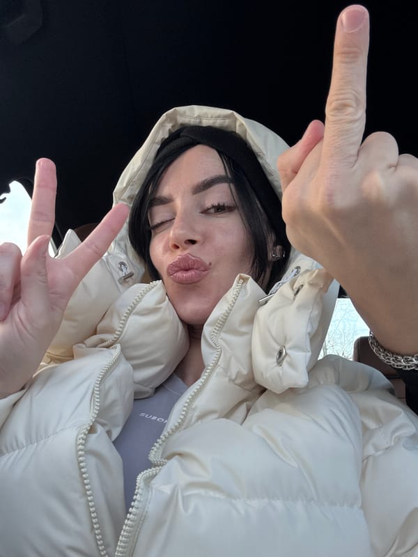 Woman takes selfie with peace sign in Krasnoyarsk