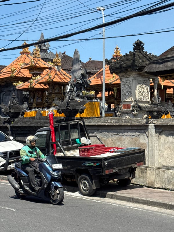 Boy in traditional dress visits Balinese temple in Nusa Dua