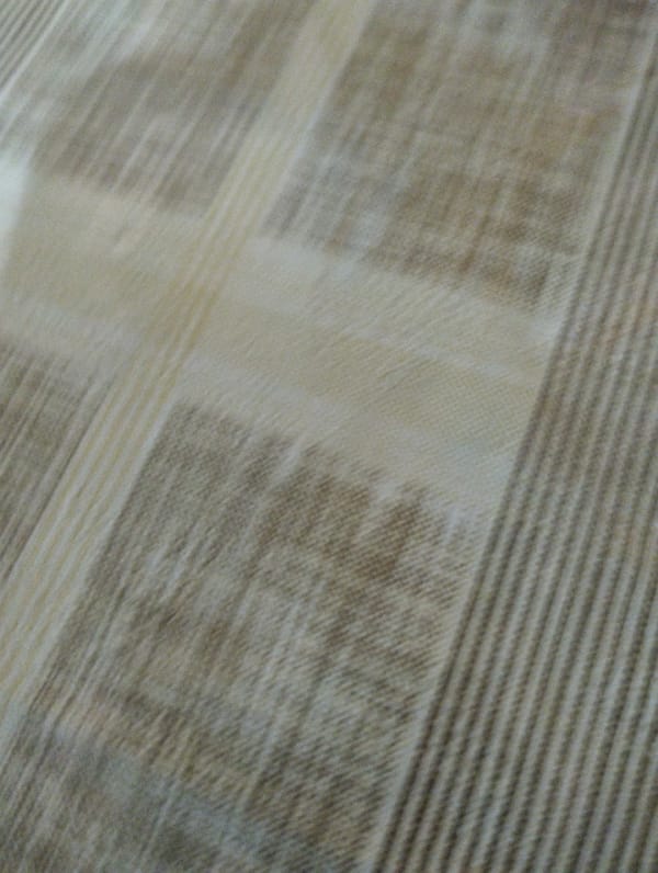 Close-up snapshots of notebooks, textiles, and household objects