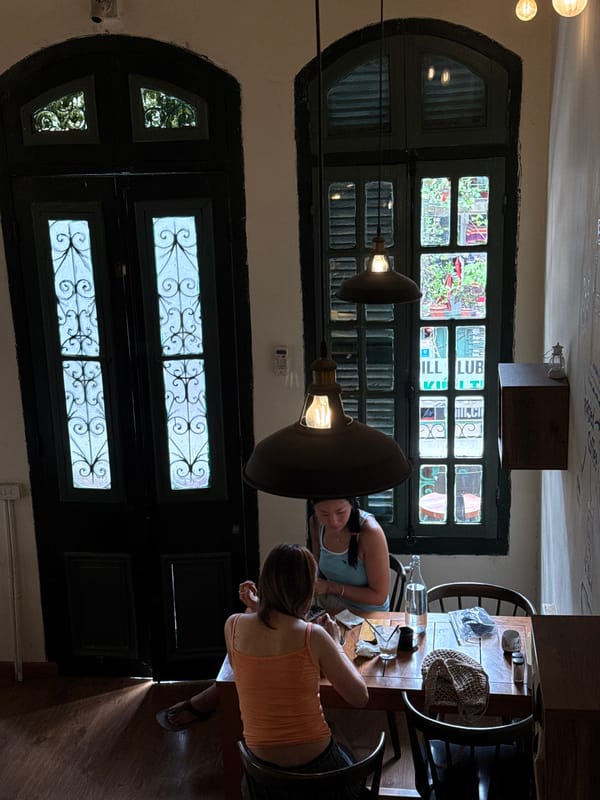 Colonial cafe interior exploration in Hanoi