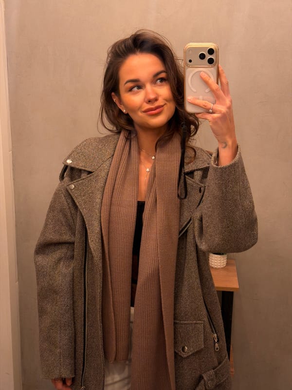 Woman takes indoor selfies in Krasnoyarsk home