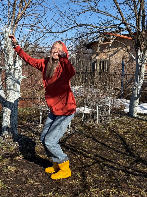 Woman photographed in muddy spring setting in Chaikovsky, Russia
