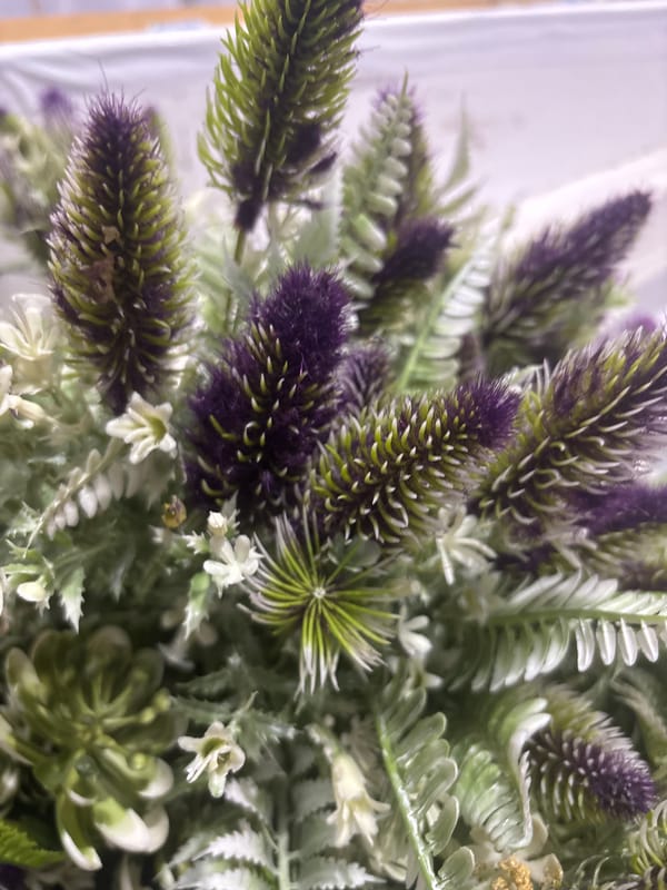 Event venue teardown with decorative florals and local food