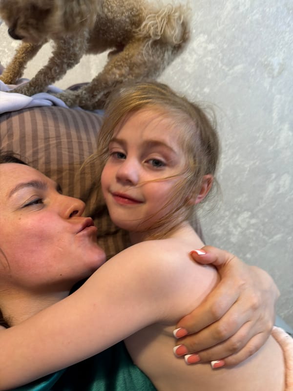 Lazy afternoon at home with a poodle, a cat, and kids