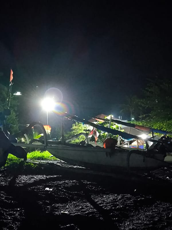 Live band plays crowded bar venue in Purwa Kerthi