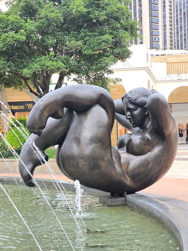 Bronze nude sculpture observed in Haining fountain plaza