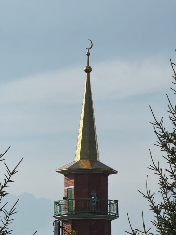 Village with a mosque and Orthodox church side by side