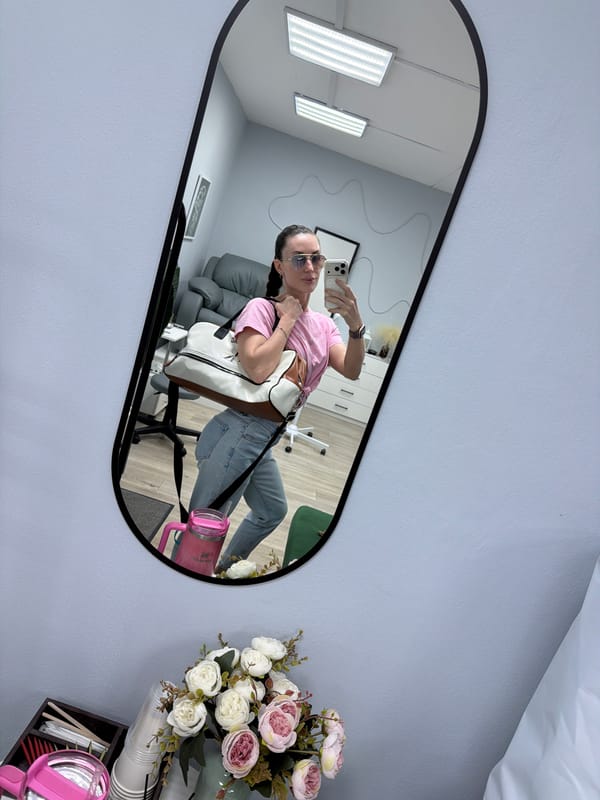 Woman documents salon visit with mirror selfies in Perm