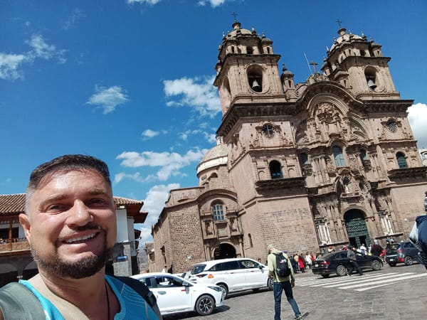 Tourist captures selfies at historic Plaza de Armas, Cusco