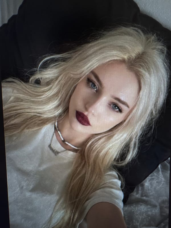 Young woman documents morning through series of selfies