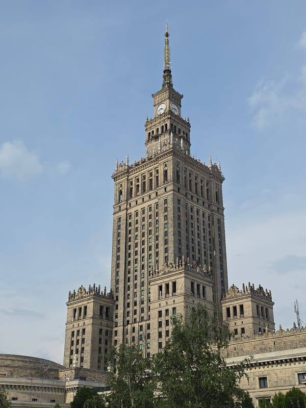 Tourist documents Warsaw landmarks during afternoon city walk