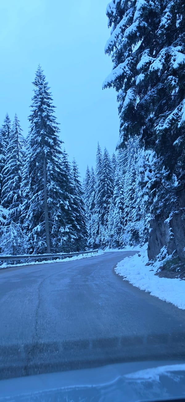 Late spring snow blankets mountain roads in Smolyan, Bulgaria