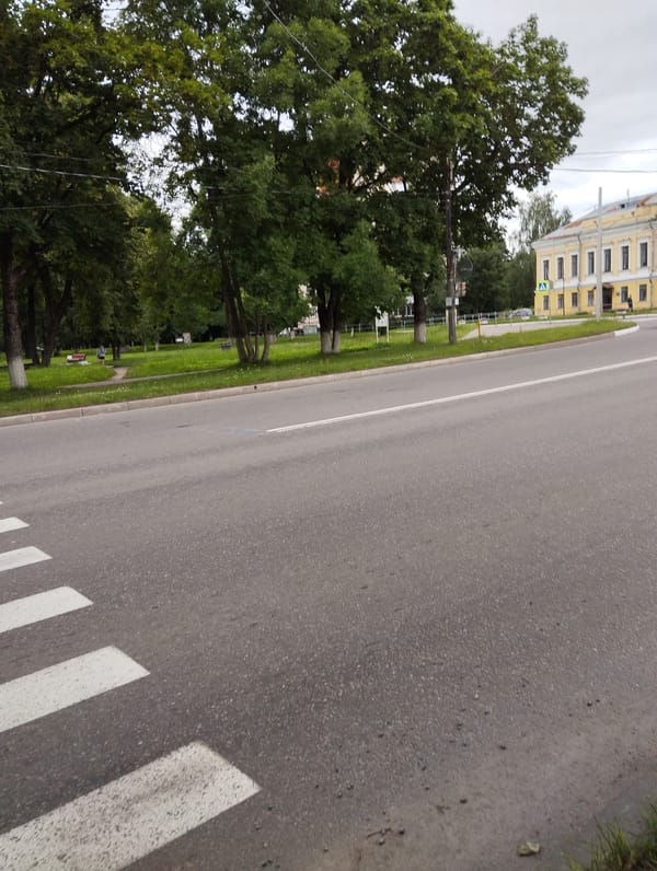 Street scenes and a military statue in Kingisepp, Russia