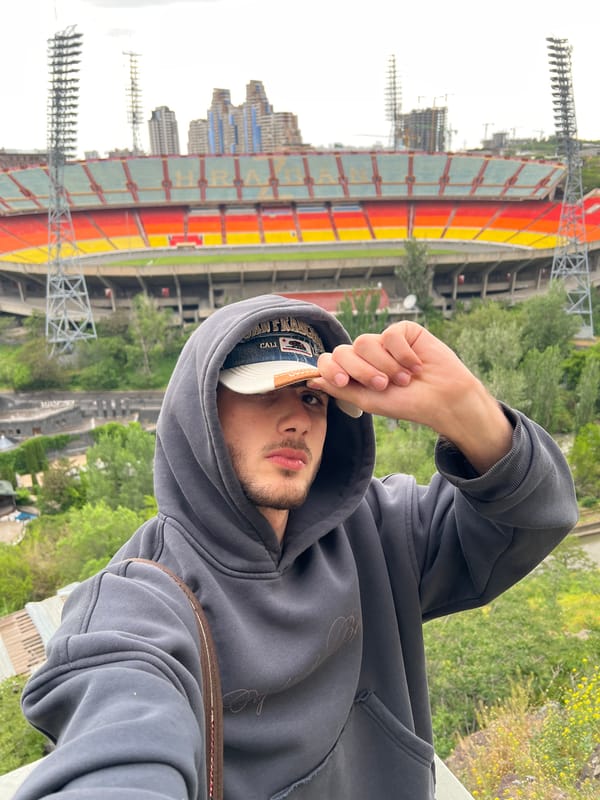 Tourist photographs Yerevan's Hrazdan Stadium from multiple viewpoints
