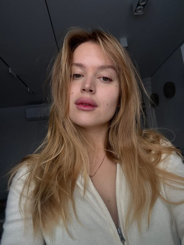 Woman photographed in multiple indoor locations in Hrodna