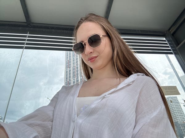 Woman Takes Extended Selfie Session in White Outfits