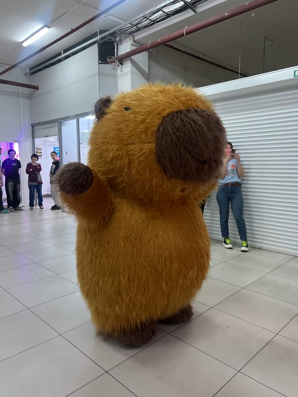 Mascot entertains children at indoor VR entertainment venue