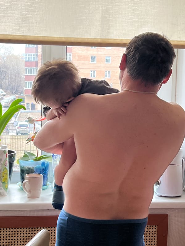 Early morning family moments captured in Perm apartment