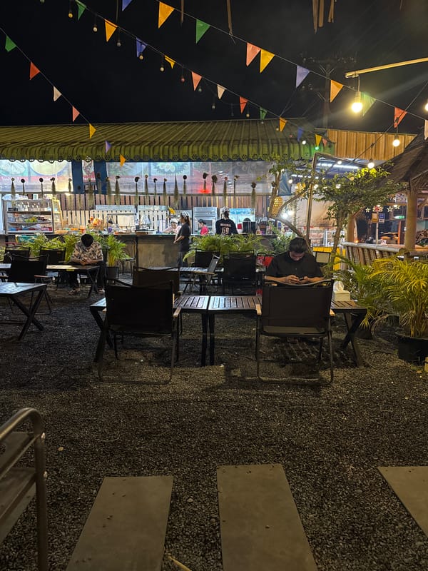 Traditional bamboo restaurant documented in Kathu, Thailand at night