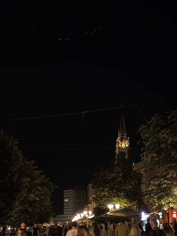 Evening stroll captures illuminated landmarks in downtown Novi Sad